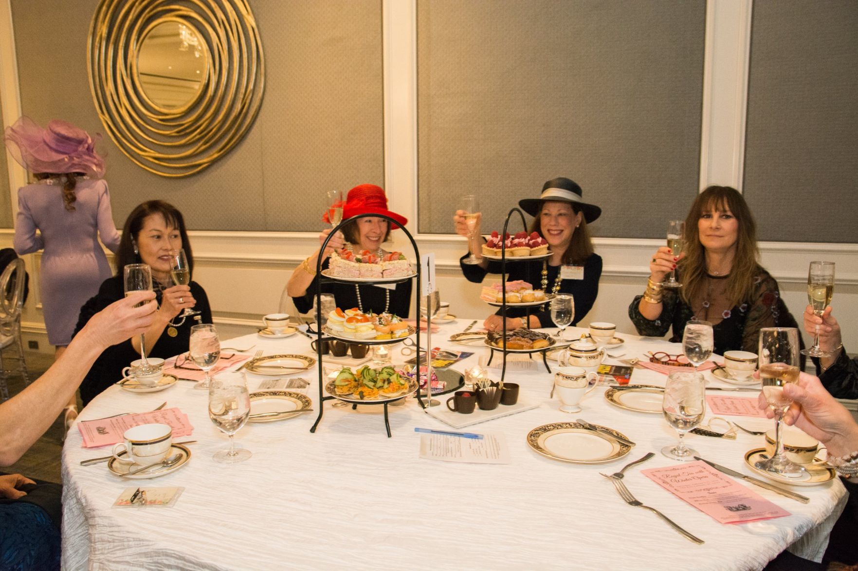 Guests have a toast before tea